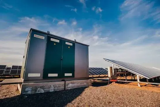 Grid-scale storage units alongside a solar plant